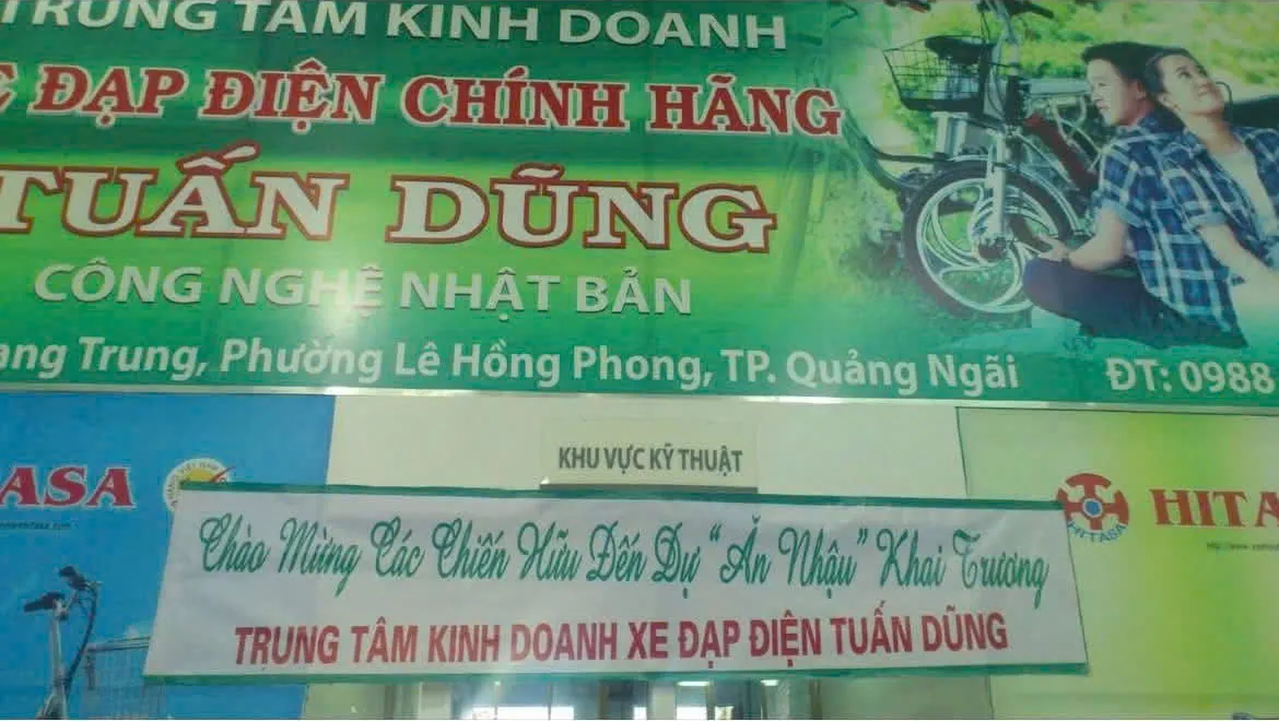 Biển hiệu Trung tâm kinh doanh xe đạp điện chính hãng Tuấn Dũng ngày khai trương năm 2013